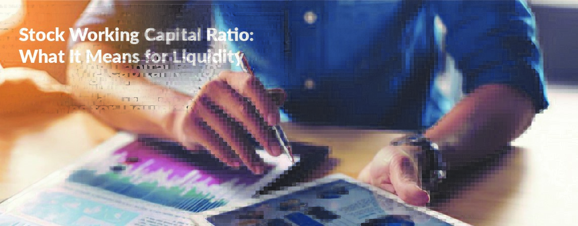 A person holding a pen and writing on a tablet